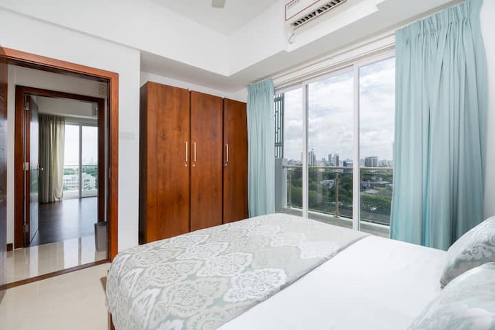 Each bedroom features a private balcony, offering views, a breath of fresh air and plenty of natural light. The rooms are well-ventilated with air conditioning and ceiling fans, and come with a cozy bed and spacious teak wardrobes for ample storage.