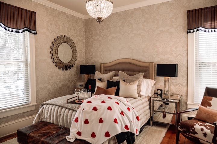 This suite features an adjustable queen bed, closet and clothing dresser!