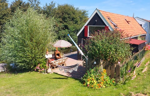 "Loft" Unique waterfront apartment including boat