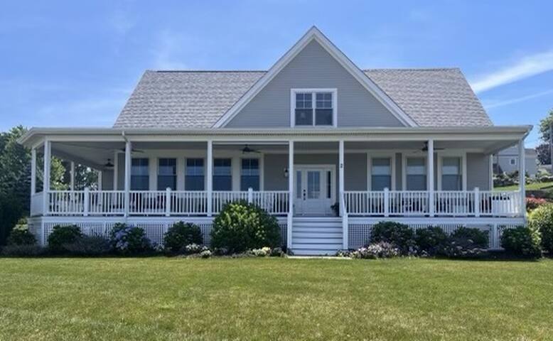 Watch the sailboats & sunset from the front porch.