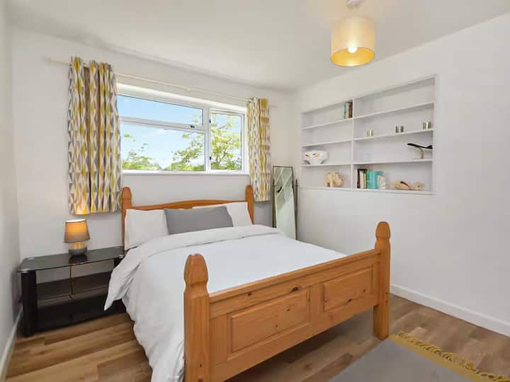 Bedroom 2:  Double bed.  Hangers and draws.  Spacious with desk, chair and garden views.