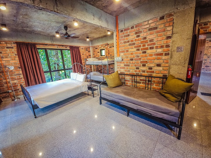 This is bedroom 22 on the first floor, with a king sized bed, bunk bed and sofa bed, with air conditioner & ceiling fan, an attached bathroom. 
It sleeps 2 to 6 pax.