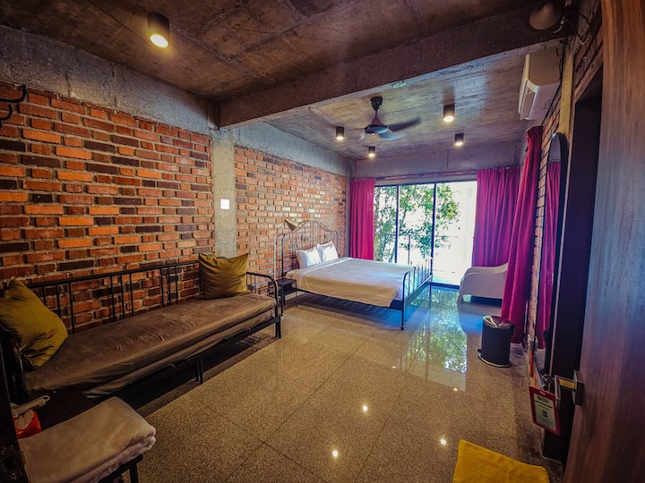 This is bedroom 3 on the first floor, with a king sized bed & sofa bed, with air conditioner & ceiling fan, an attached bathroom. It sleeps 2 to 4 pax