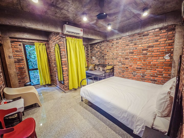 This is bedroom 1 on the first floor, with a king sized bed & sofa bed, with air conditioner & ceiling fan, an attached bathroom. It sleeps 2 to 4 pax
