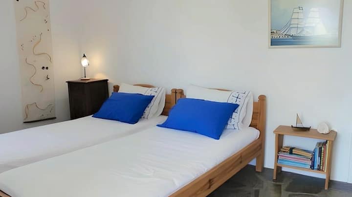 Twin bedroom with access to patio