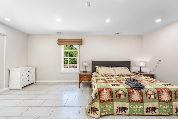 Lower level bedroom. Walkout on to patio near firepit. 