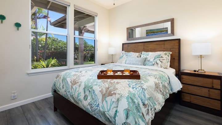 Secondary bedroom with queen bed and luxury linens