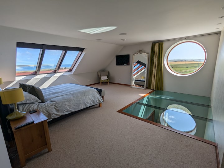 First floor master suite with glass floor