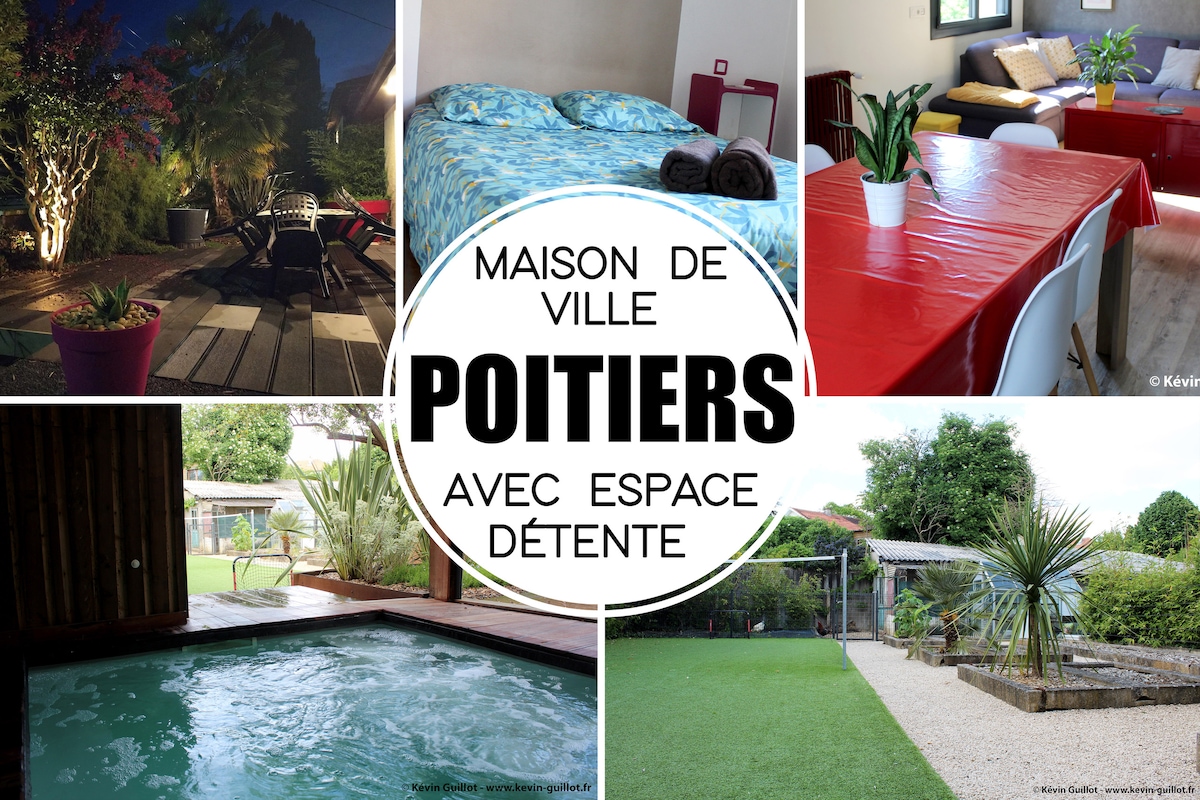 A tranquil outdoor space features a well-maintained patio with seating surrounded by greenery. The inviting jacuzzi is situated nearby, alongside a landscaped yard offering various recreational areas suitable for relaxation and leisure activities.