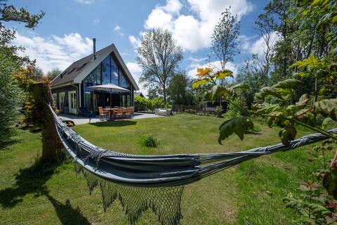 Summer house, sleeping in the greenery near the beach.