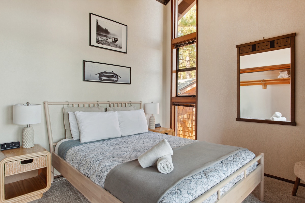 The third bedroom, located on the top floor, features a queen bed and offers some of the home’s most spectacular views.