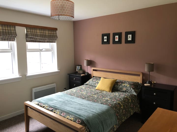 Main double bedroom with built-in wardrobe and ensuite bathroom