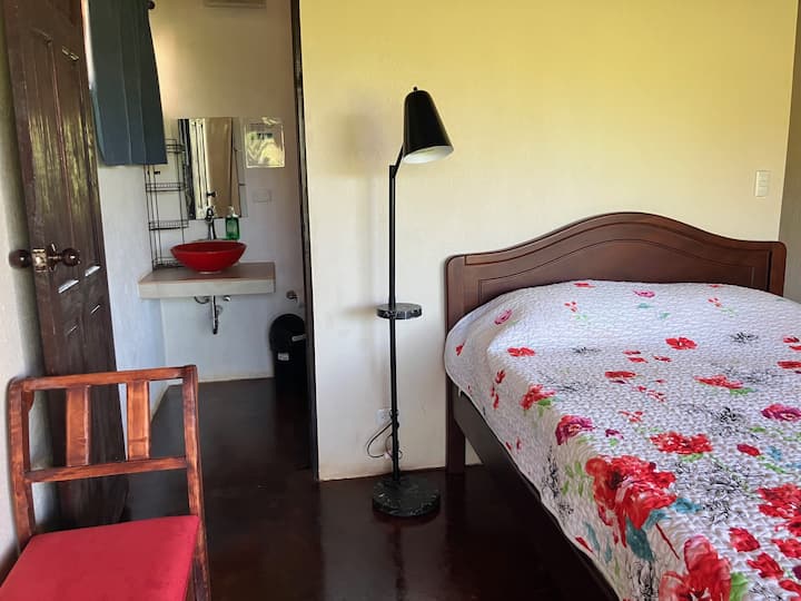 Sunset bedroom with jungle views and work station