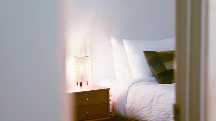 Twin beds shown, but this room can be made into one king bed instead.