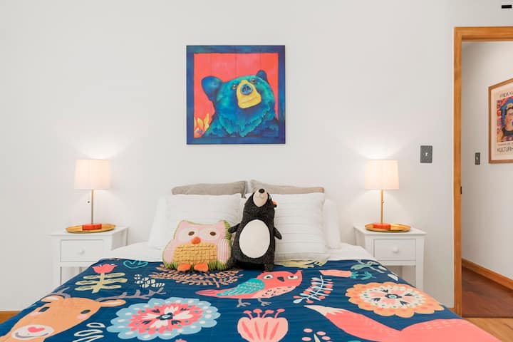 A favorite bedroom in the home for morning sunshine and view of back yard toward the south... the Woodland Critters room is off of the main hallway next to the Yeti room. This room backs to the kitchen and the washer & dryer. 