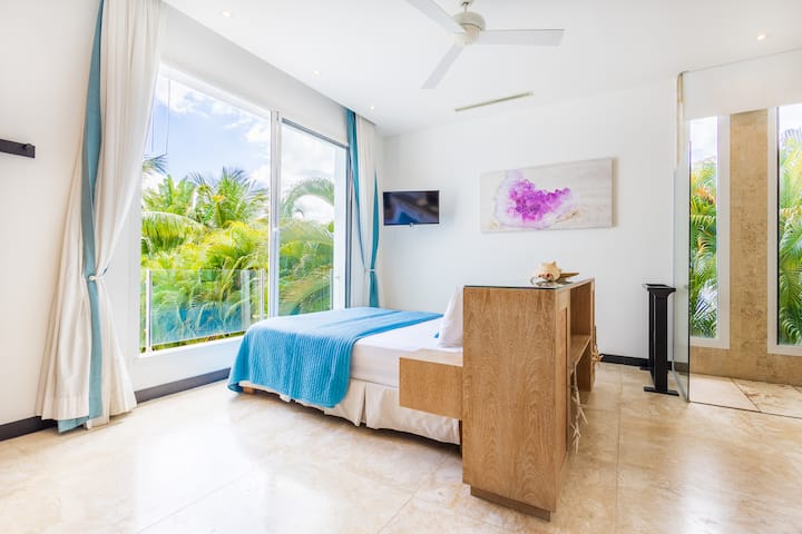 Luxurious bedroom with a queen bed and stunning view!