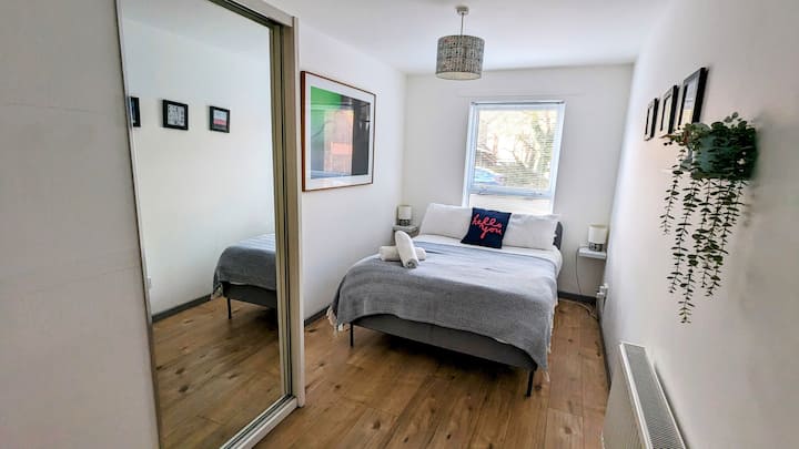 The bigger of the two bedrooms. Travel cot provided on request can be used in this space.