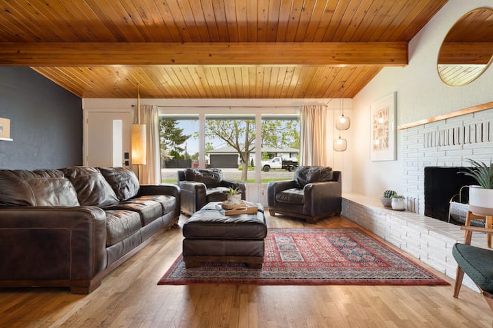 Spacious front living room. Fireplace does not work. Our Nest thermostat will keep you cozy in summer or winter. 