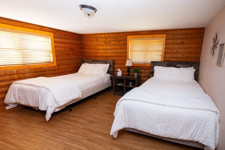 The first bedroom offers a cozy queen bed and an additional twin bed perfect for extra guests!