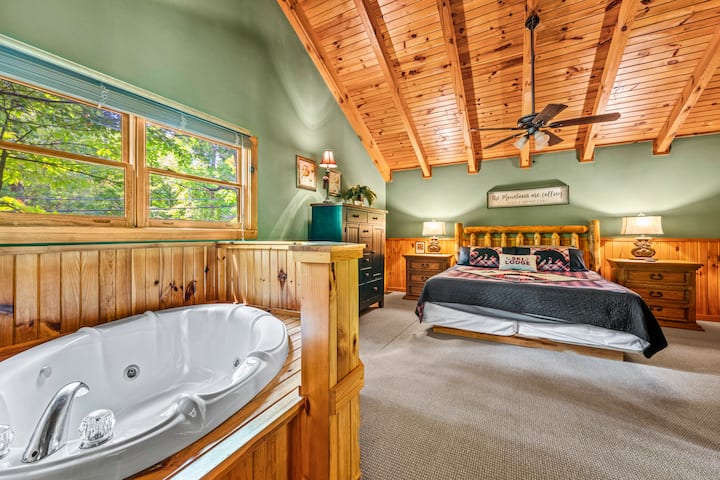 Immerse yourself in comfort with a master bedroom and bathtub experience.