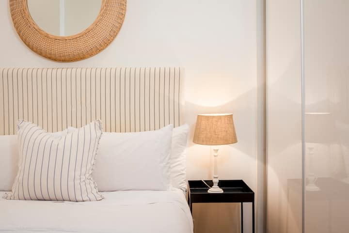 Down pillows, high quality linen and block out blinds in the bedroom.