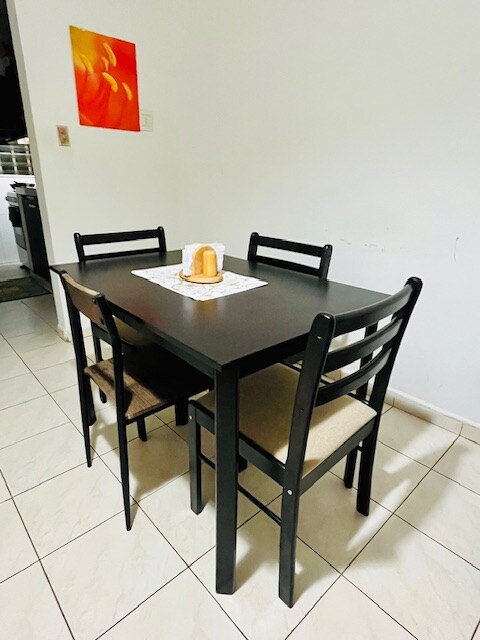 Shared dining area image 1 at Habitación #1 Colibrí in David