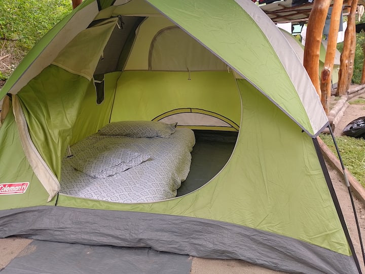 The campsite is for those larger groups (>5 people) that don't fit into our cabins. Our private tents offer three extra spaces to sleep.