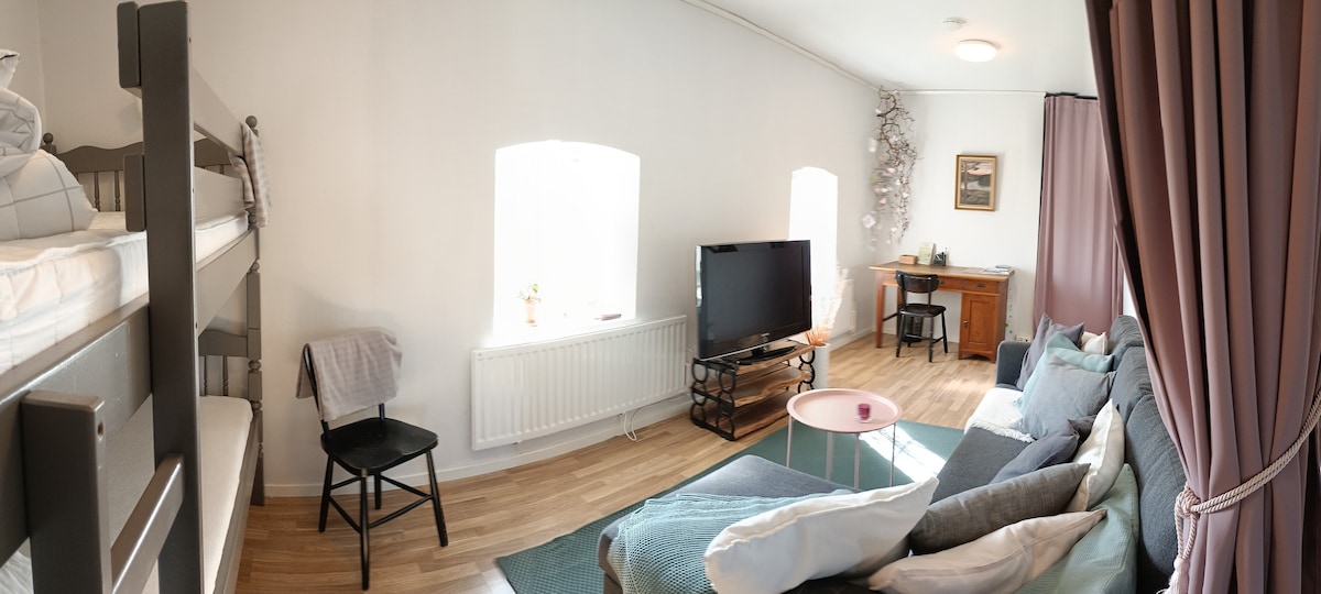 The TV room can be shared to get the sofa bed/TV sofa separate from the bunk bed. There is a mattress topper for the sofa bed that is 140x200 cm made out. 