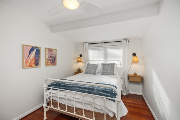 The second bedroom is cozy with a queen size bed and a full sized closet!