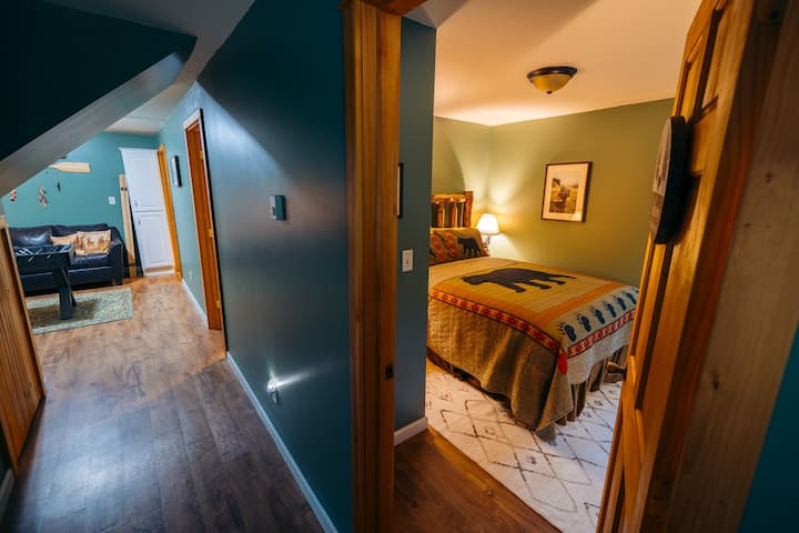 Take a sneak peek of the Bear Den. You won't regret selecting this room featuring a luxurious queen bed with high quality linens. You will sleep like a bear in hibernation.
