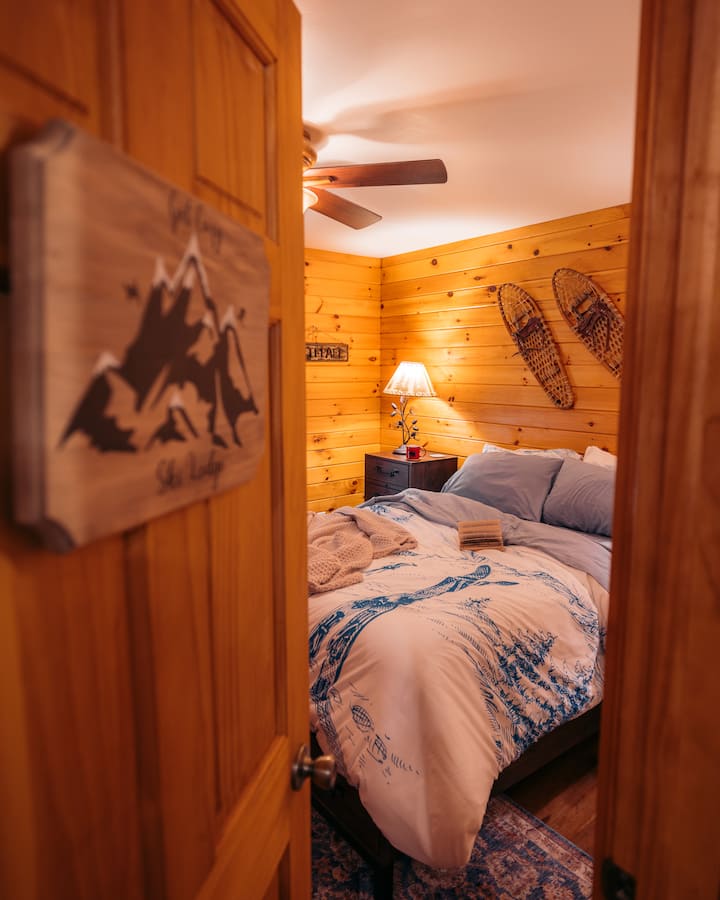 Welcome to the Ski Lodge room. This room offers two separate closet spaces and a full bathroom. Plus a luxurious Simmons Beautyrest Lux Queen Mattress and Malouf bedding.
