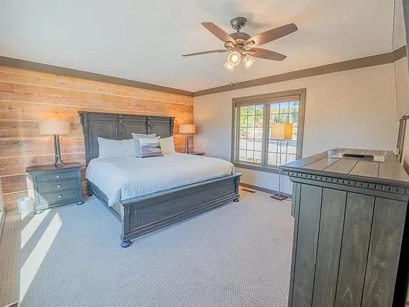 Master bedroom, king bed, separated from the rest of the home, with master bath, and private deck entrance.