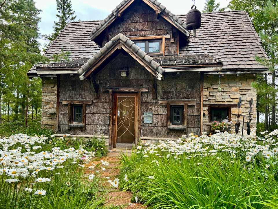 A stone-and-bark cabin on Lake Medora, Eagle Harbor Township, Michigan, United States, photo 7 of 10
