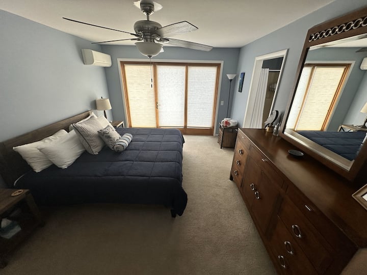 Enjoy the views of the lake from the spacious king bed in the master bedroom. Includes full ensuite bathroom.