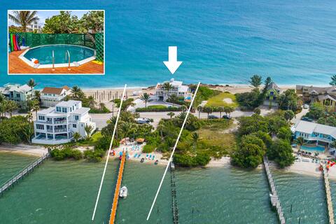 Avalon: 8BR/5BA w/heated pool, hot tub, dock+more!