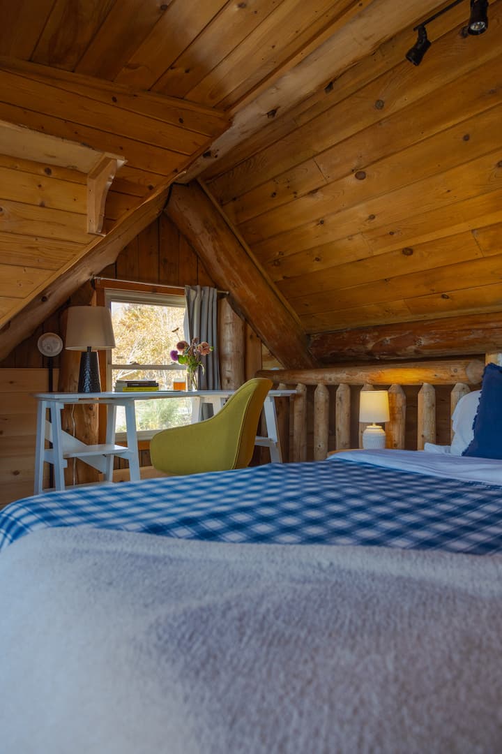 Bedroom 2 is a loft with desk and stunning views