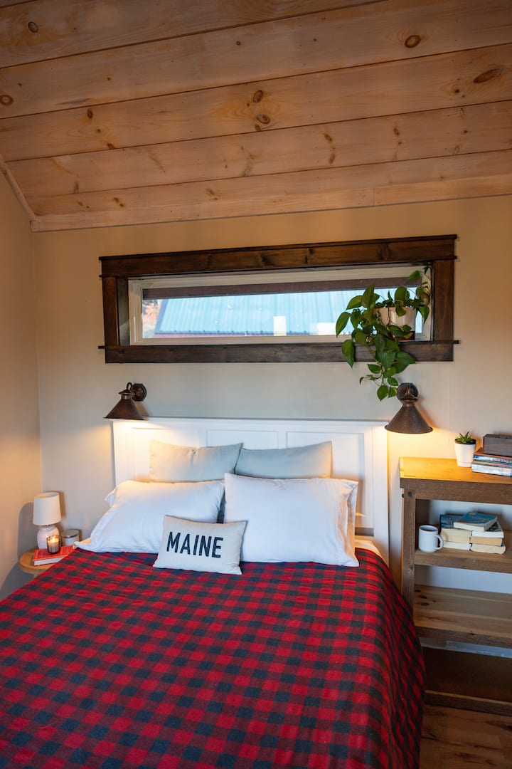 First floor bedroom with LL Bean flannels and heat/ac units. 