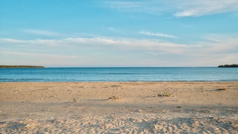 SUNNY's | Private Beach Front Cottage with Sauna