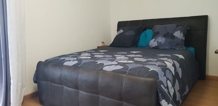 Bright room with king-size bed and premium bedding. You also enjoy a private bathroom and toilet for privacy and comfort throughout the stay.