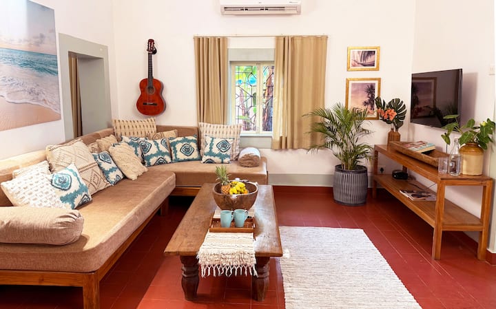 Thoughtfully designed with tropical charm and modern comforts, your living room features a smart TV and air conditioning, perfect for unwinding after a sun-soaked day or a refreshing dip in your pool.