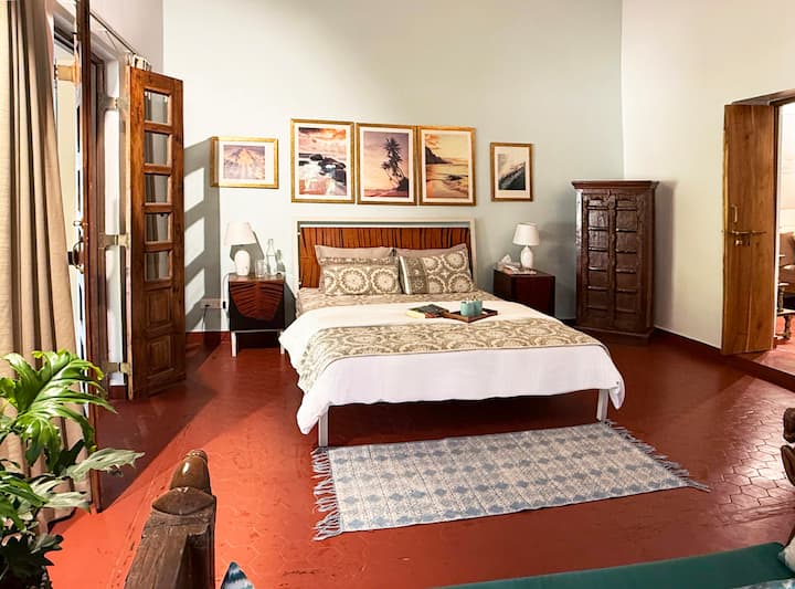 The villa’s boho-chic interiors are accentuated by beautiful antique furniture, adding a touch of Goas timeless elegance to your stay.