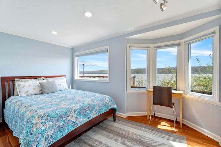 Downstairs bedroom has bay window views.