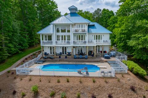 Private pool on the lake with 2 level boathouse