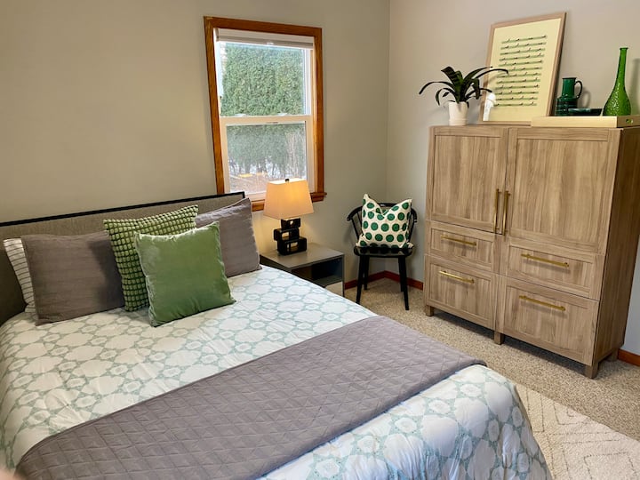 Second bedroom with queen bed and darkening shades
