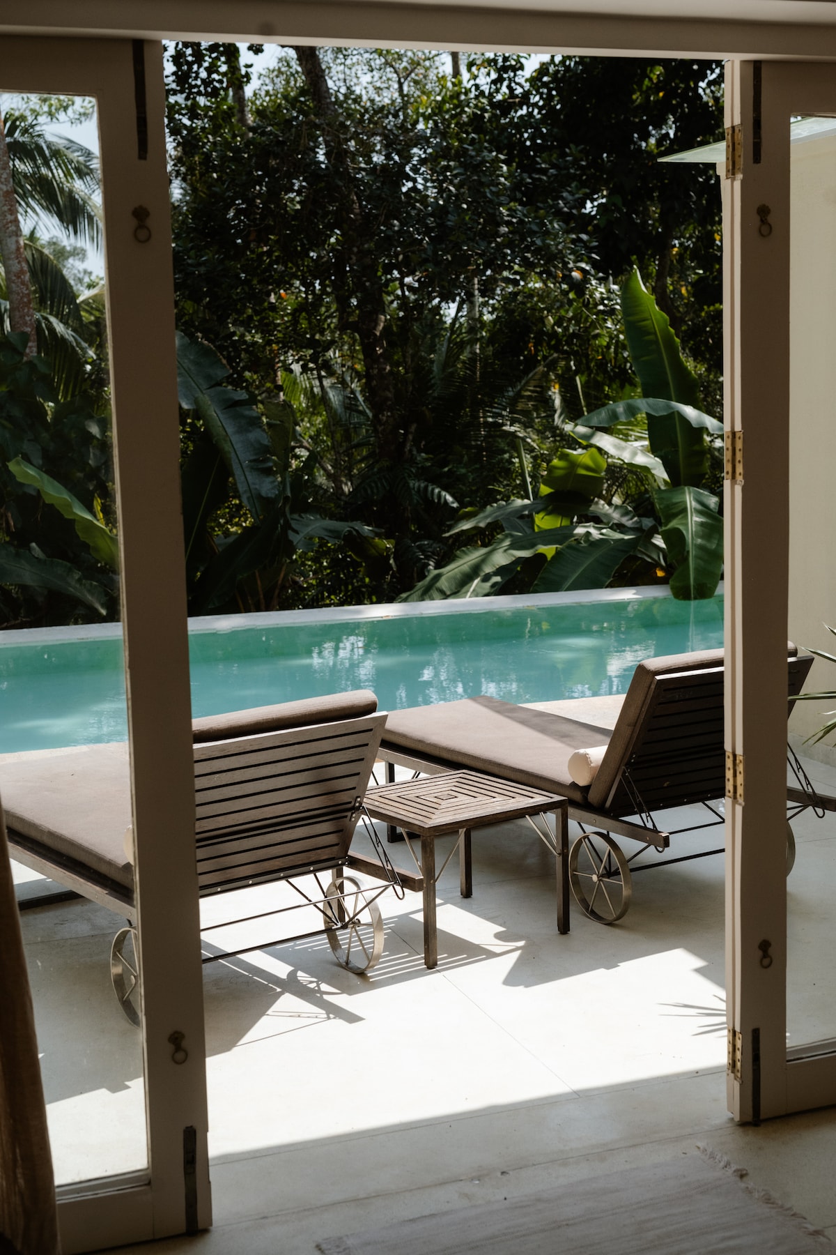 The view from the master bed onto the pool is so serene. 
There are loungers right outside the patio doors so you can wake up and lazily wander outside at your pleasure.