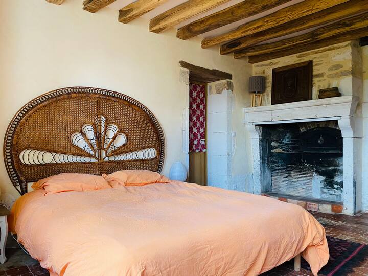 The ground floor bedroom with a queen size bed