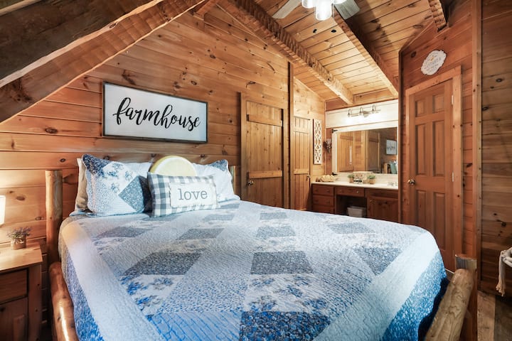 Curl up under the beams in this snug farmhouse nook.