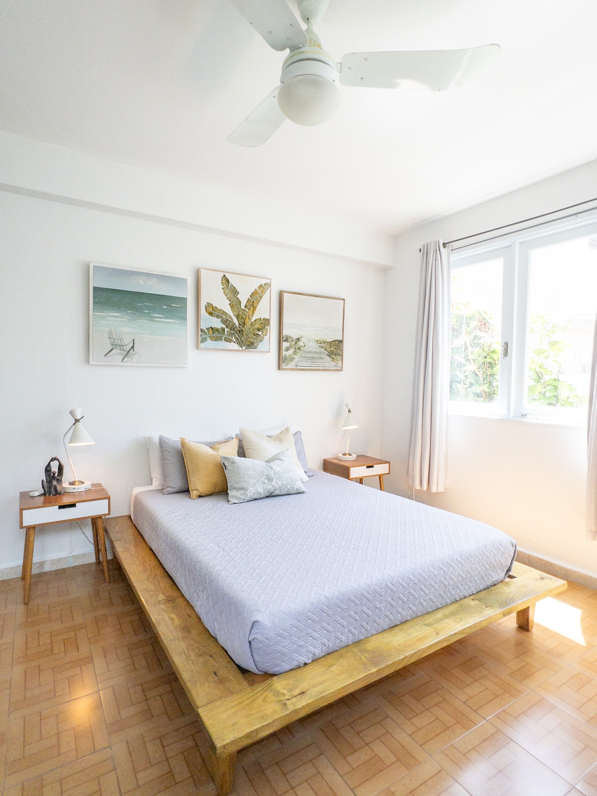 Custom-made queen bedroom with an inverter AC unit, ceiling fan, and blackout curtains