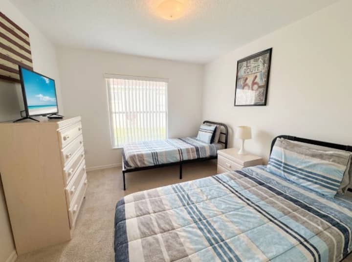 Vibrant and fun, spacious twin room.