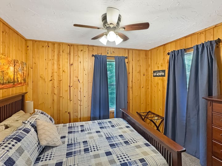 Second queen bedroom has a comfortable new queen bed and linens, with blackout curtains. You'll sleep well!  The bedside lamps have USB ports and we provide a multi-charger cord for each.